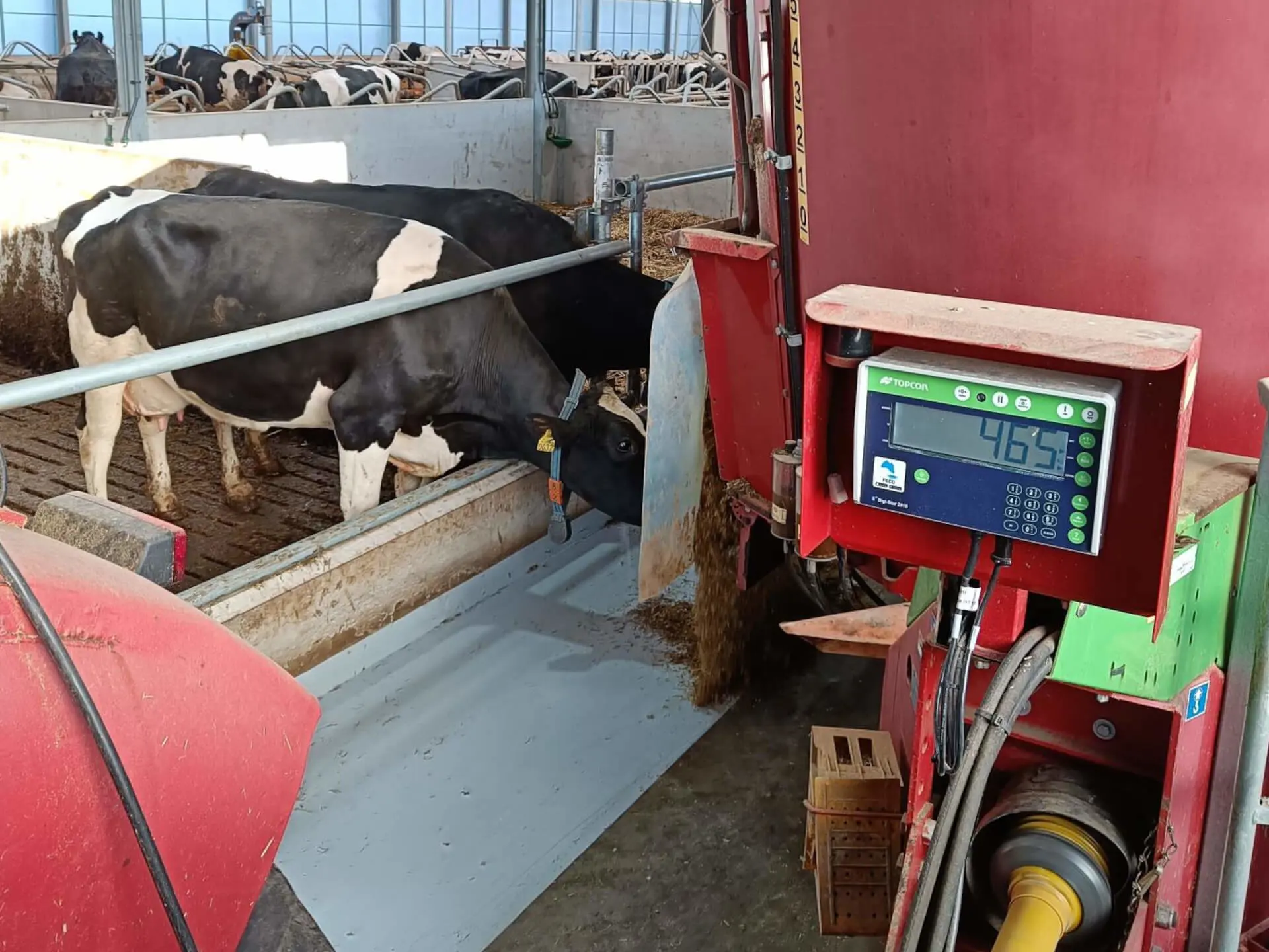 Voermengwagen met Topcon Tapfeed